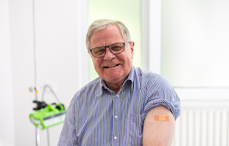 https://www.albertsons.com/content/dam/pharmacy/pharmacy-b2c-new/vaccines/smiling-old-man-showing-band-aid-on-his-left-arm.png